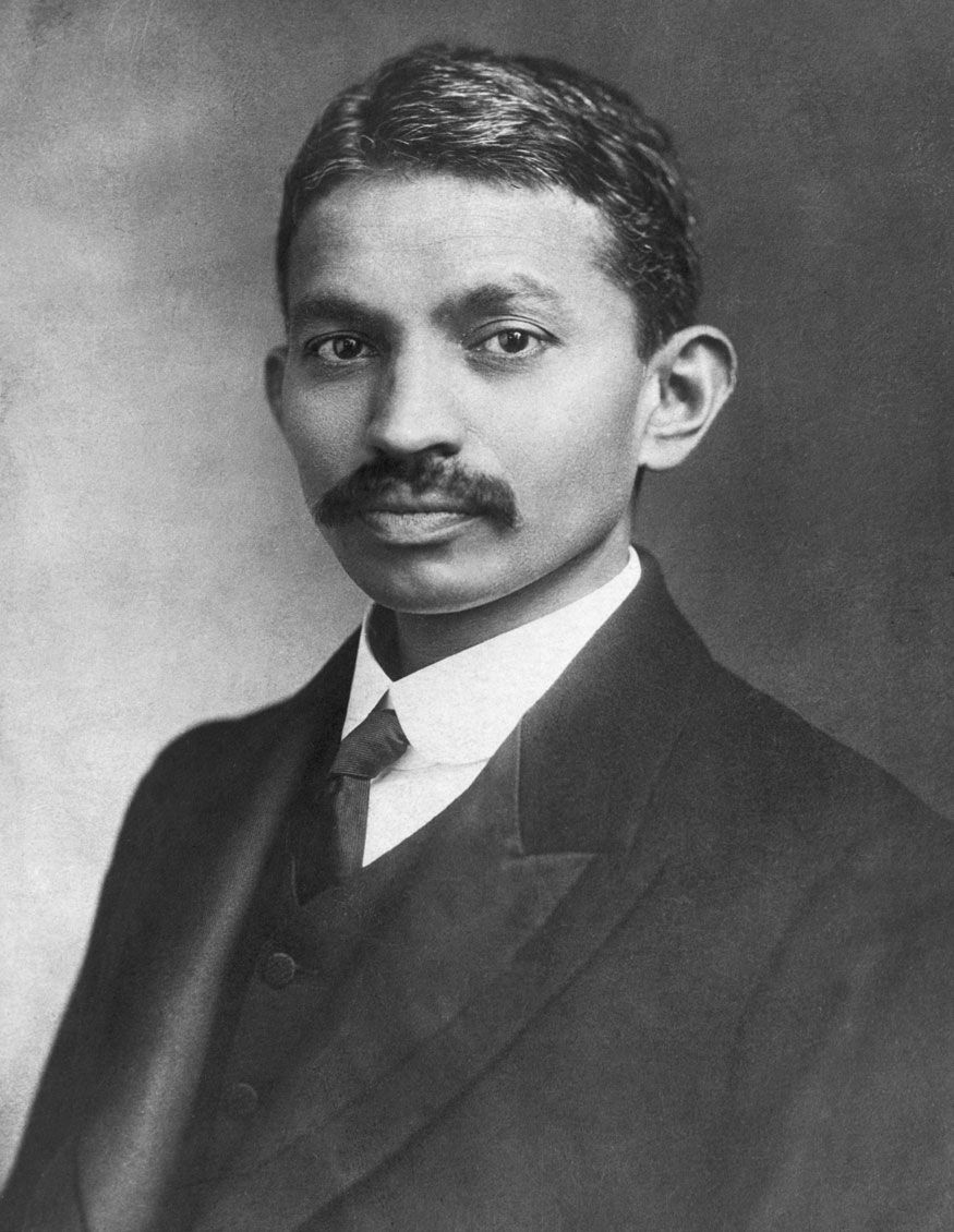 Mohandas Gandhi in a dark Western suit, photographed in London in 1906.