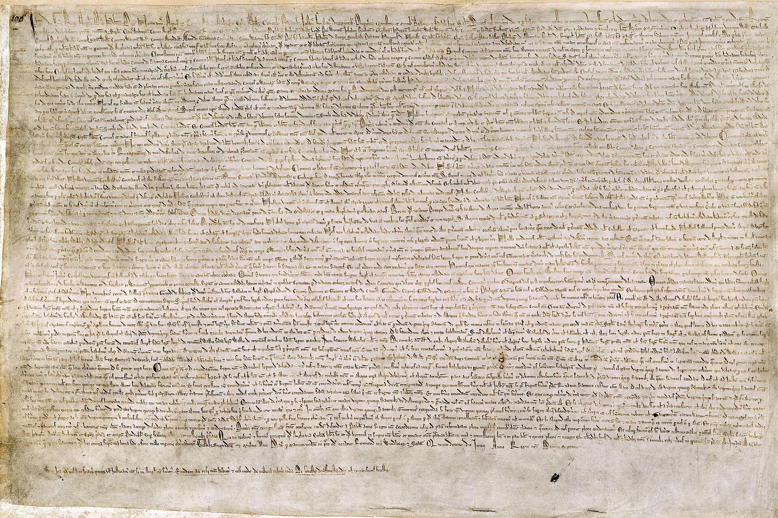 The 1215 Magna Carta, a dense Latin manuscript on a single sheet of parchment.